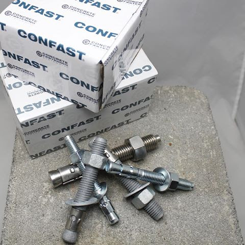 a pile of concrete anchors and concrete fasteners
